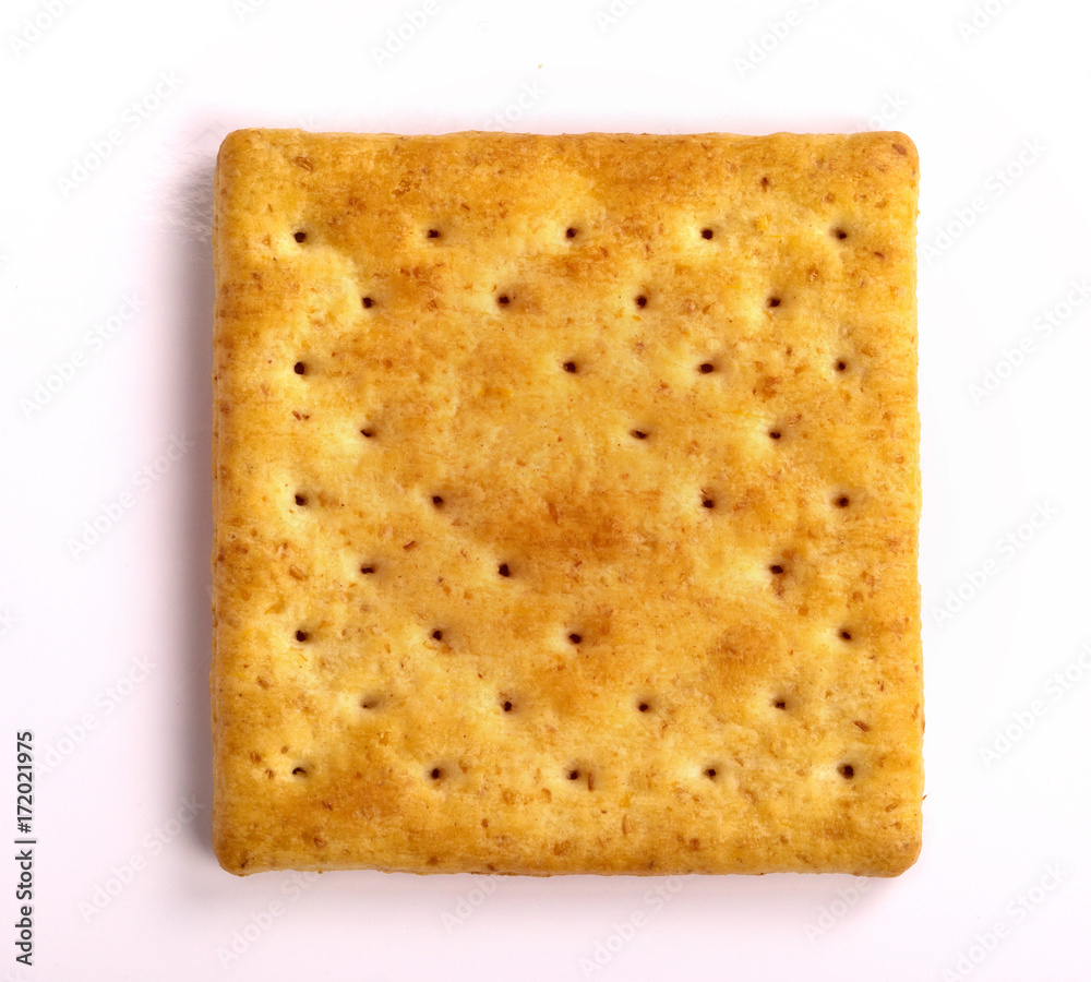 Close up the healthy whole wheat cracker on white background , top view or overhead shot Close up the healthy whole wheat cracker on white background , top view or overhead shot