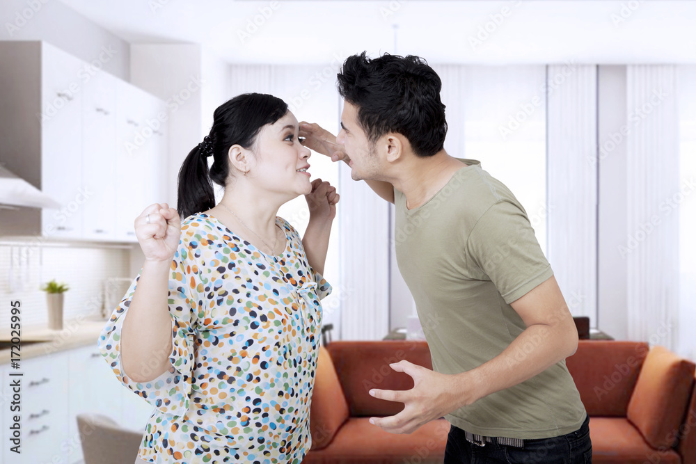 Young couple blaming each other Young couple blaming each other