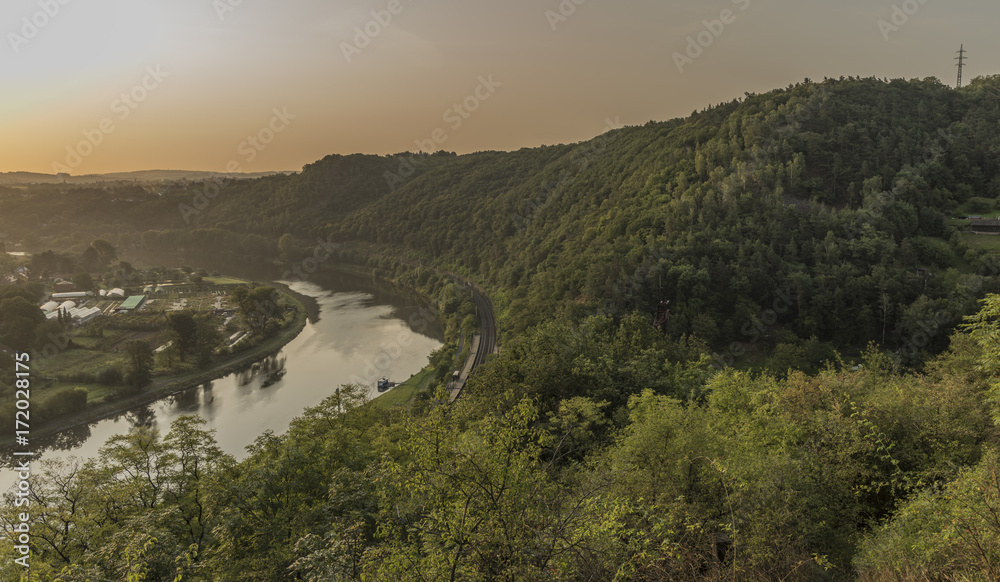 Sunrise over valley of river Vltava