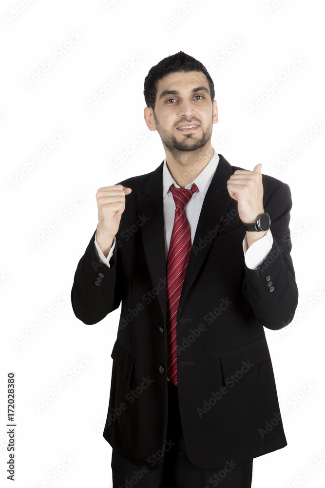Arabian businessman celebrating his success on studio Arabian businessman celebrating his success on studio