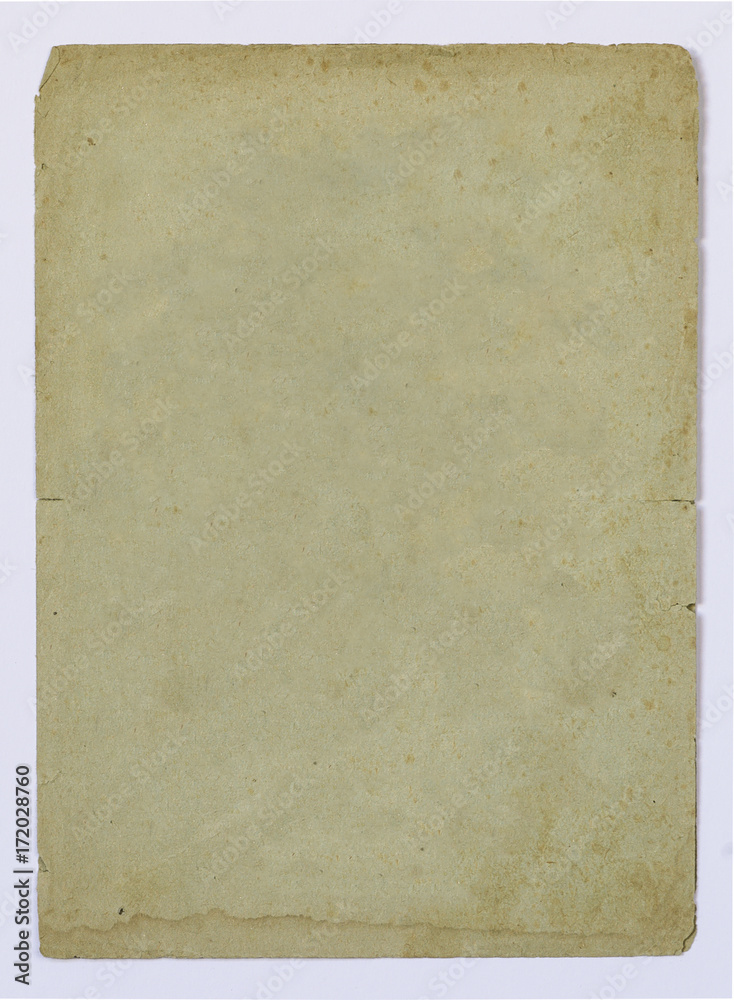 Blank old paper sheet with stains on white background Blank old paper sheet with stains on white background
