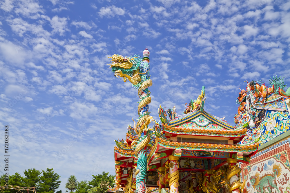 Dragon statue on china temple on blue sky