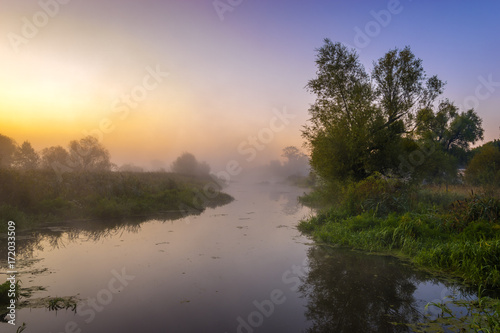 eautiful, misty morning on the river in the summer