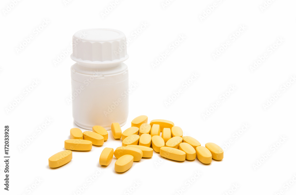 Yellow tablet pills isolated Yellow tablet pills isolated
