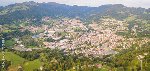 Drone aerial view to the villages of Leffe, Gandino, Casnigo, Peia and Cazzano Sant Andrea, located at Gandino Valley, Bergamo, Italy