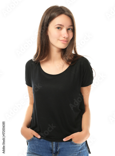 Pretty teenage girl posing on white background