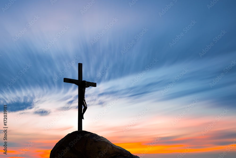 Jesus Christ on the cross over sunrise background Stock Photo | Adobe Stock
