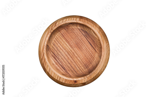 Cooking bowl made of natural wood on a round wooden cutting board, isolated on white background, closeup, top view