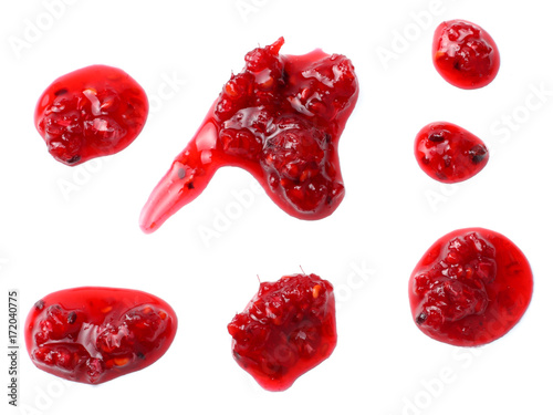 raspberry jam splash isolated on white background. top view photo