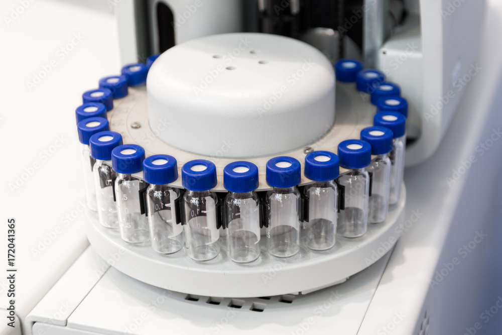 A cassette with glass test tubes, a fragment of gas chromatograph equipment. A cassette with glass test tubes, a fragment of gas chromatograph equipment.