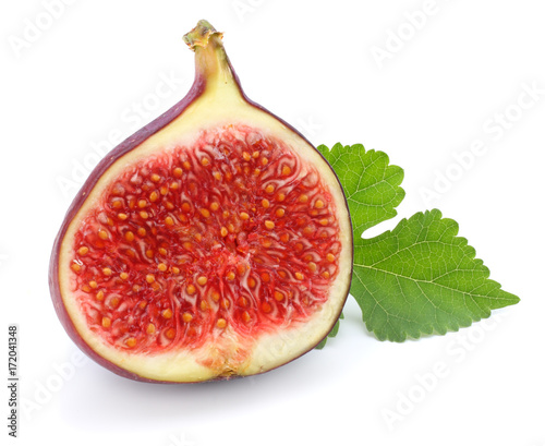 Fig fruit with green leaf isolated on white. Clipping Path