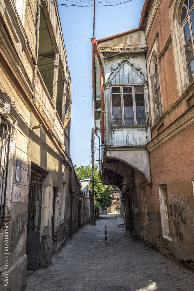 Walk through the narrow streets of the old city of Tbilisi (Georgia).