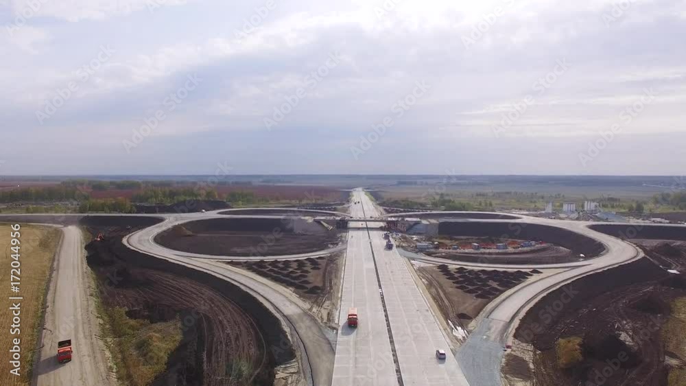 Construction of the traffic intersection. Construction of a bridge on the road. Construction of the traffic intersection. Construction of a bridge on the road.