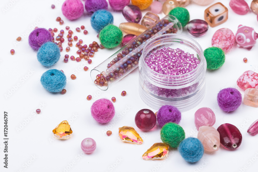 Glass, seed beads and felted beads Glass, seed beads and felted beads
