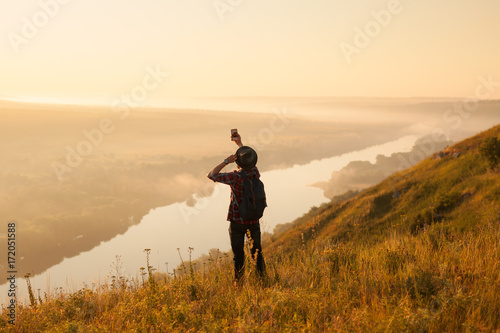 Man with smartphone in nature #172051588