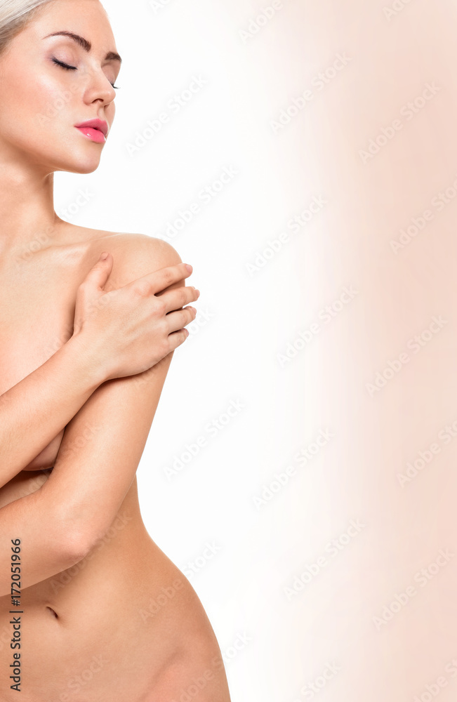 Beautiful young woman with clean skin nude topless breasts. Beautiful woman covering her nude breast. Beautiful young woman with clean skin nude topless breasts. Beautiful woman covering her nude breast.