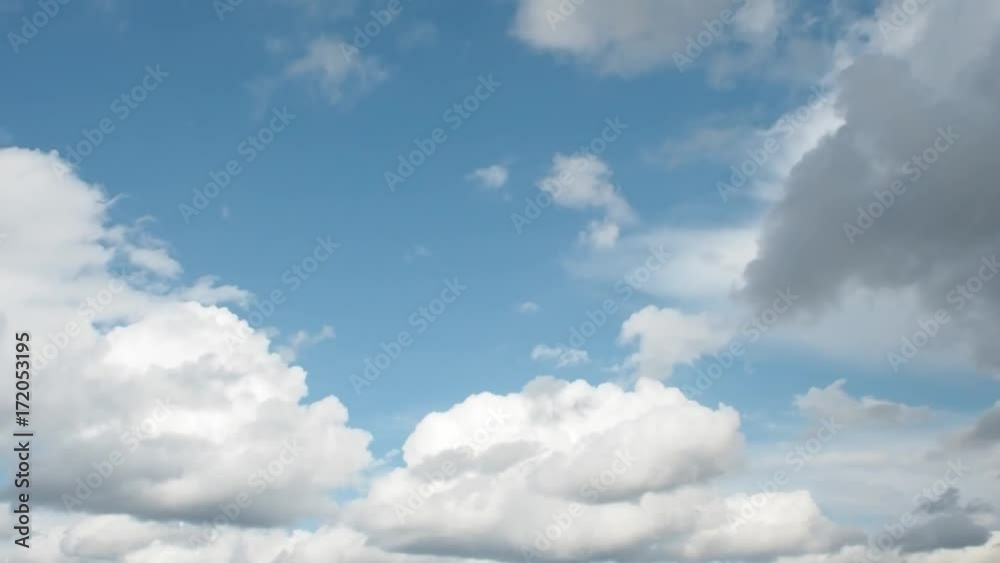 Sky becomes lighter. Clouds are flying quickly on the blue sky Sky becomes lighter. Clouds are flying quickly on the blue sky