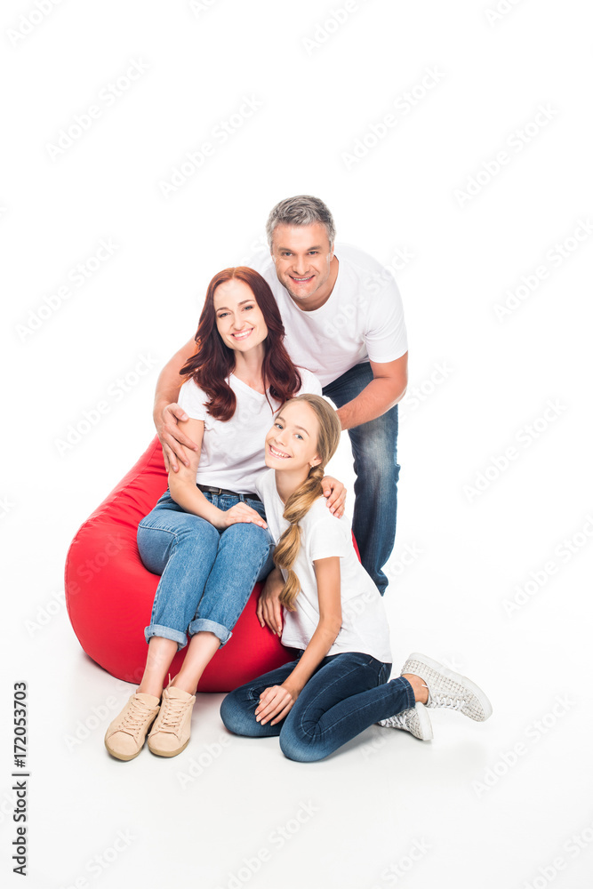 family on bean bag chair