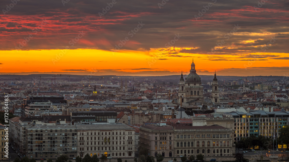 Budapest, Hungary - Golden sunrise and amazing colorful clouds over Budapest with the Saint Stephen's Basilica
