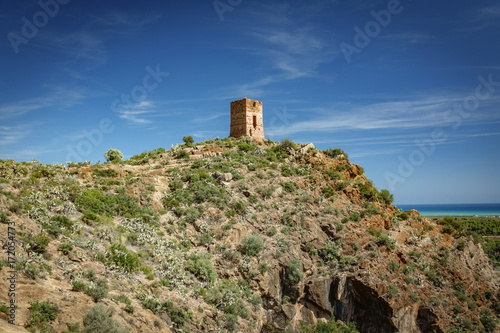 Antique stone tower over hill © F.C.G.