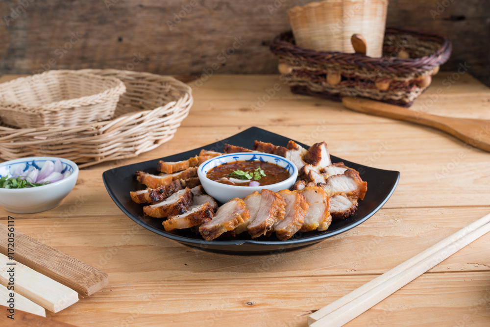 Deep Fried Crispy Pork Belly Cooked with Garlic and spicy dipping sauce Deep Fried Crispy Pork Belly Cooked with Garlic and spicy dipping sauce