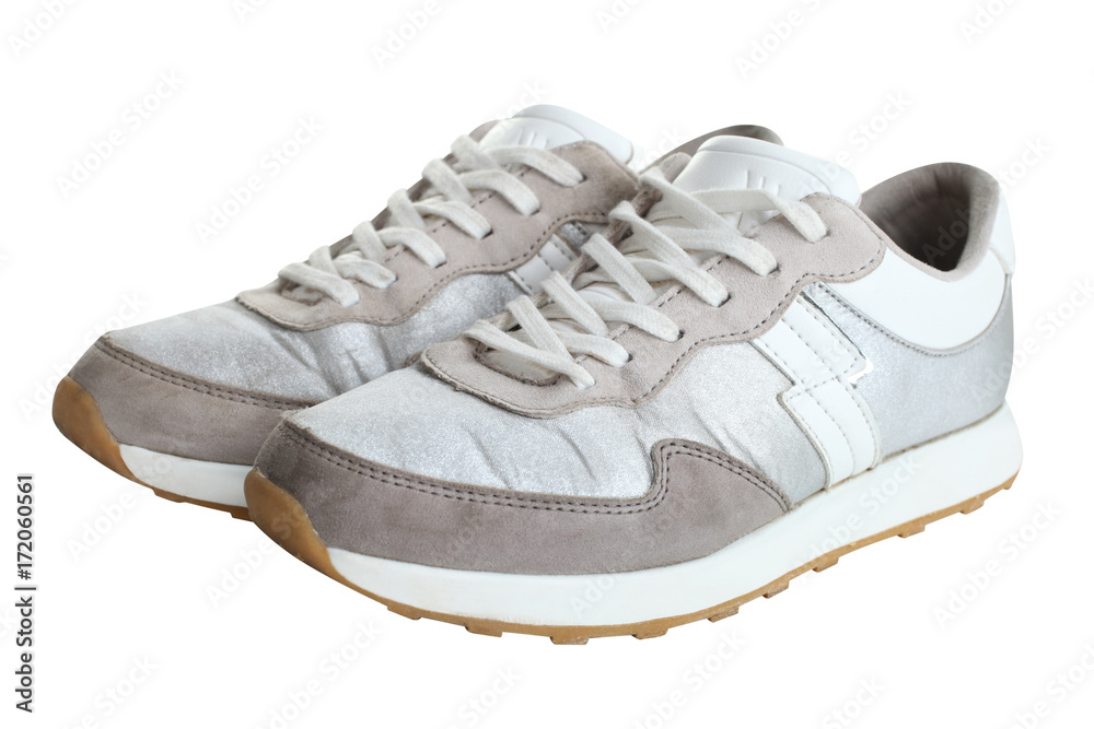 One pair of silver sneakers One pair of silver sneakers