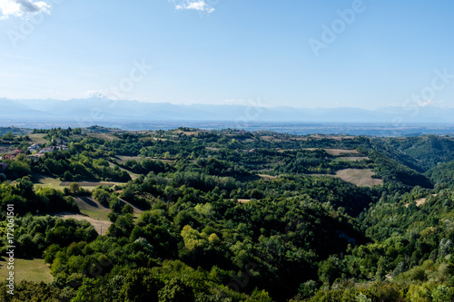 View of Langhe hills and of italian Alps from the top of the medieval tower of Murazzano  Piedmont  Italy.