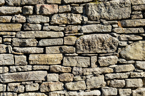Regular stone wall for background and textures.