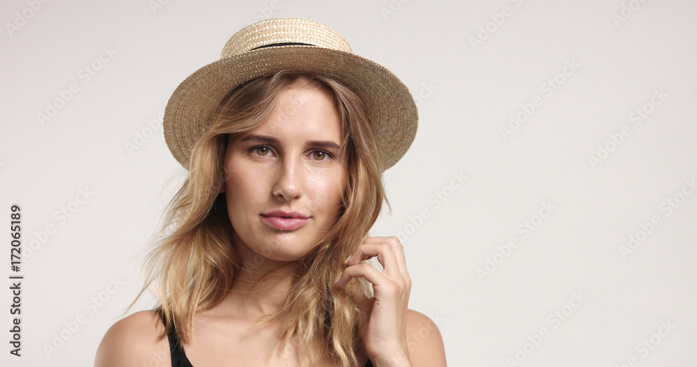 Pretty blond girl in straw hat Pretty blond girl in straw hat