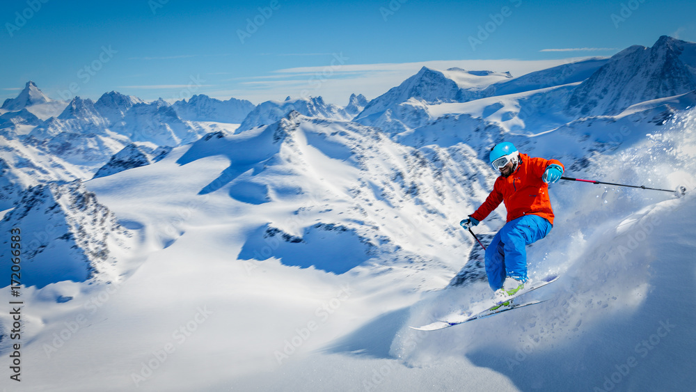 Skiing with amazing view of swiss famous mountains in beautiful winter snow  Mt Fort. The matterhorn and the Dent d'Herens. In the foreground the Grand Desert glacier.