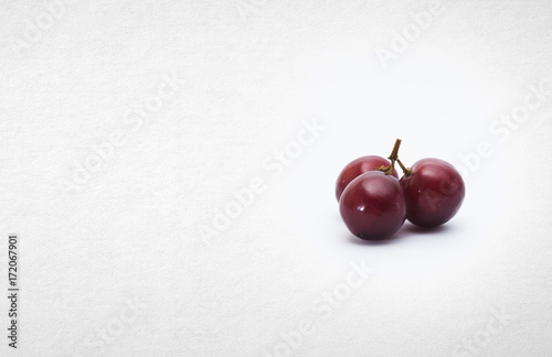 Grapes or red grapes on a background.