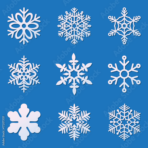Laser cutting snowflakes set. Template for die cut paper snowflake isolated on blue background. Scrapbooking chipboard.