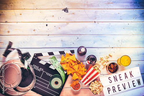 Overhead view of large film reel and tickets photo