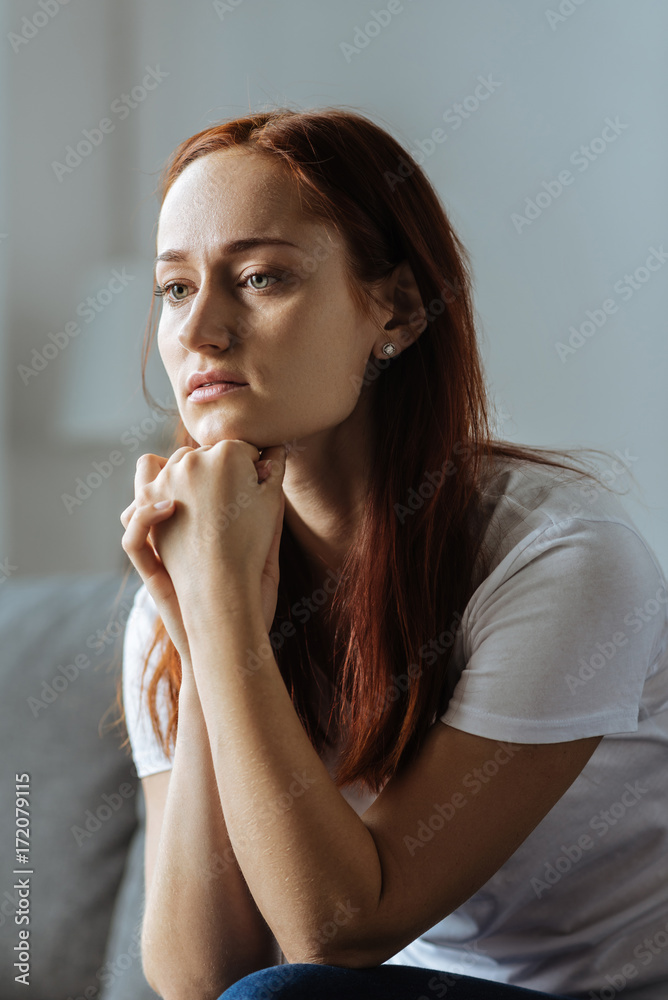 Depressed sad woman being unhappy Depressed sad woman being unhappy
