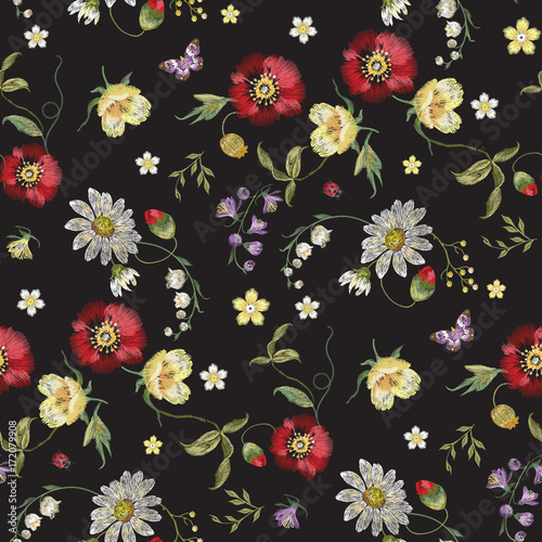 Embroidery floral seamless pattern with butterfly and flowers. Vector embroidered illustration for textile and wearing design.