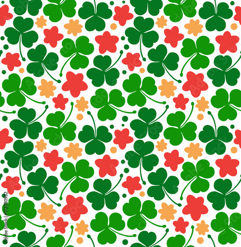 vector pattern with clovers, trefoils. St. Patrick's day texture. Decorative floral background with flowers