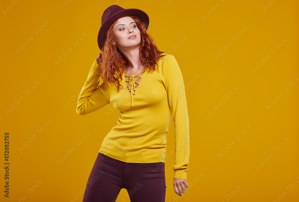 young redhead woman in autumn color isolated on fall  background