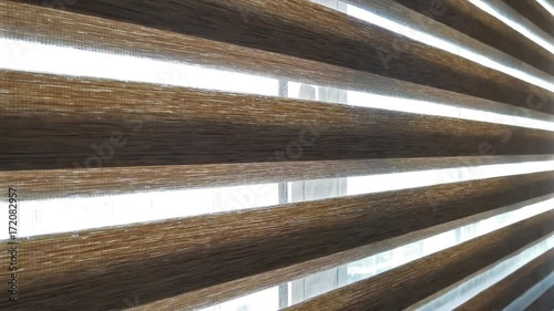 Opening window zebra blind curtain.