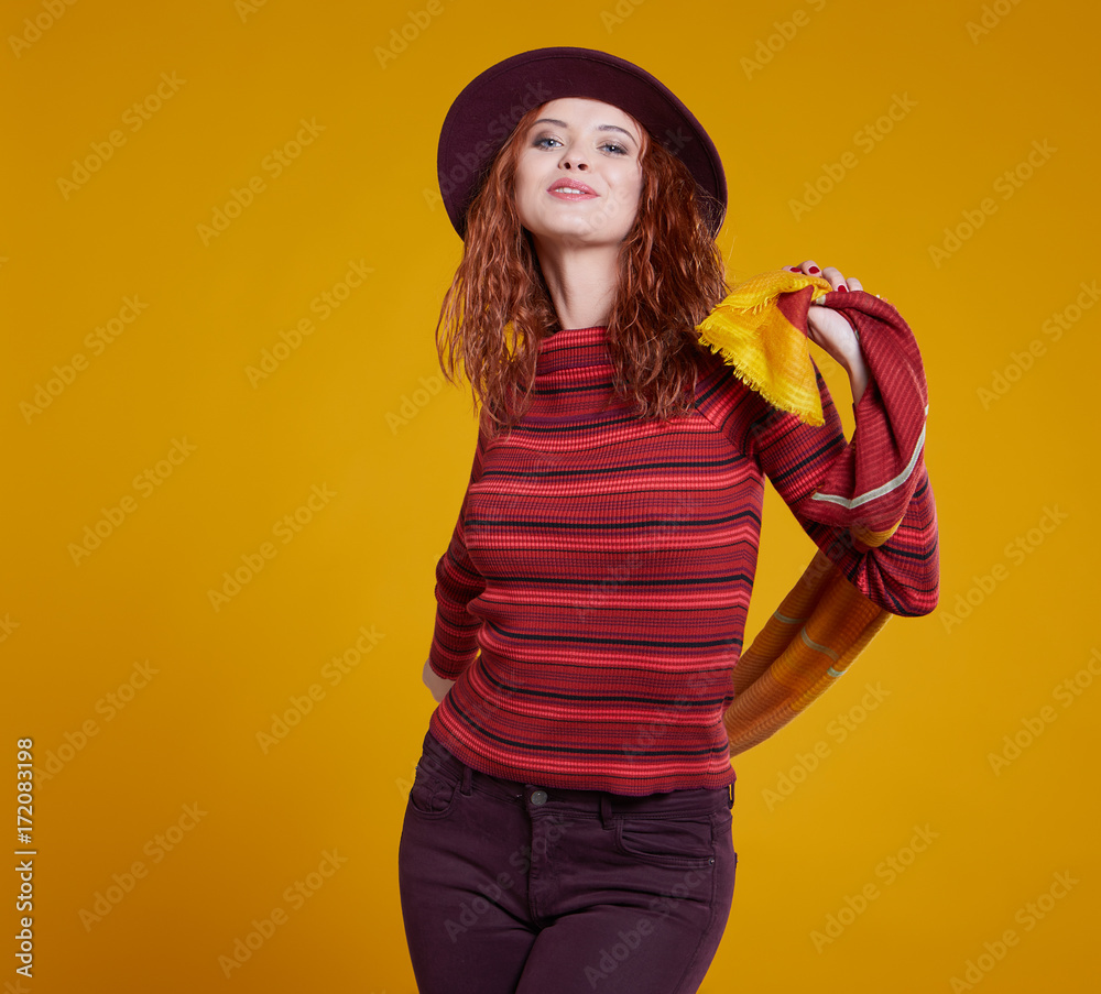 young redhead woman in autumn color isolated on fall background young redhead woman in autumn color isolated on fall background