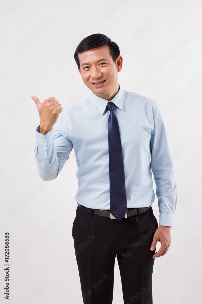 businessman pointing up thumb up to his side businessman pointing up thumb up to his side