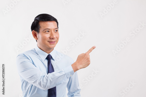 businessman pointing his finger away