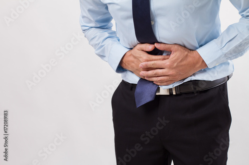 sick business man with stomach ache, indigestion, gastritis, diarrhea, dyspepsia, constipation symptoms