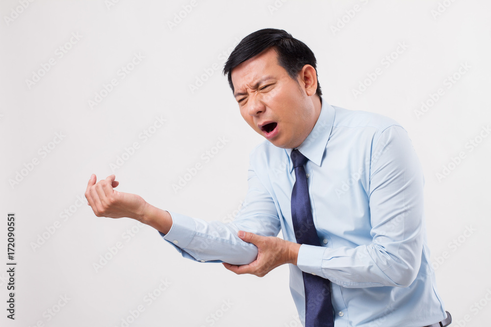 man suffering from elbow joint pain, gout arthritis man suffering from elbow joint pain, gout arthritis