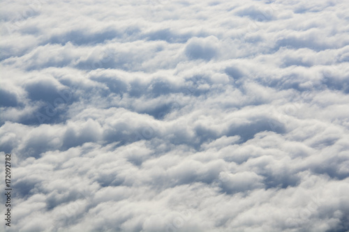 Higher than clouds. Above the clouds. Beautiful background of clouds over the mountains.