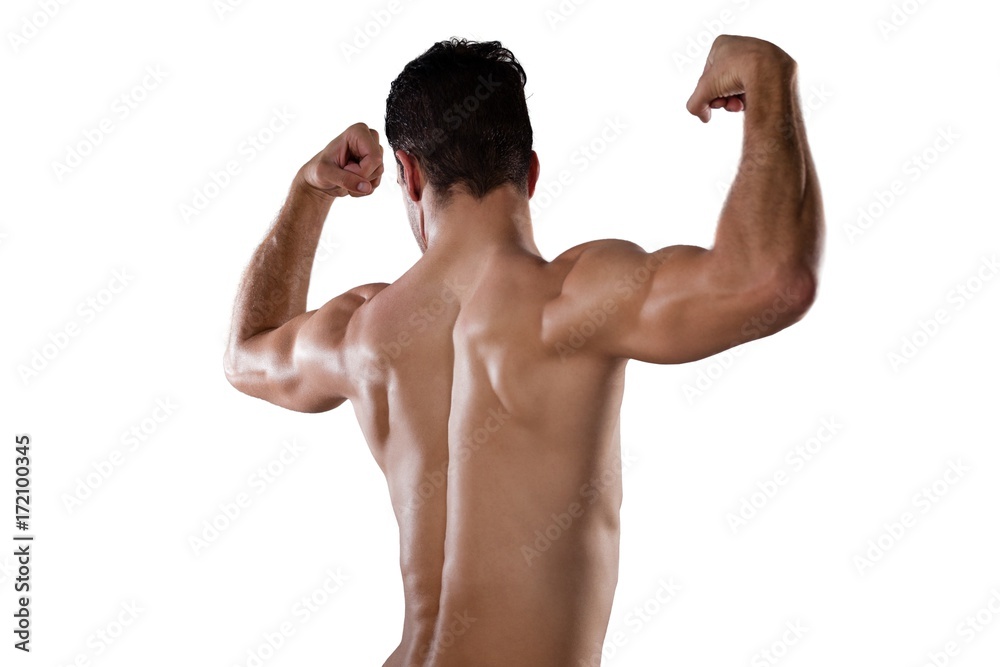 Rear view of sportsman flexing muscles Rear view of sportsman flexing muscles