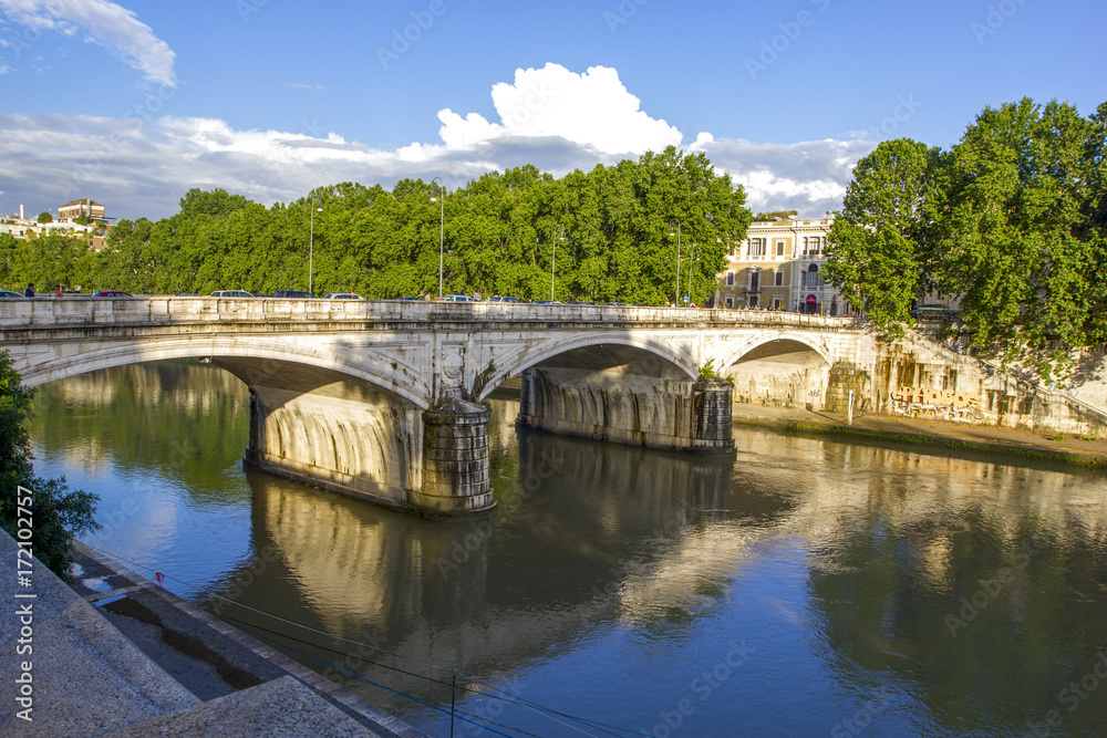 View of Rome and Tiber river. Beautiful European River Bridge. Italy