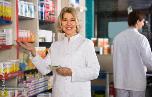 mature woman pharmacist working © caftor