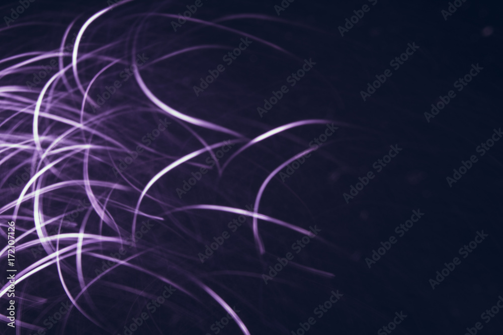 Abstract background of white lines in motion on black wallpaper. Bokeh of defocused curves spinning into spiral, blurred neon leds, festive or business backdrop of city lights and fireflies