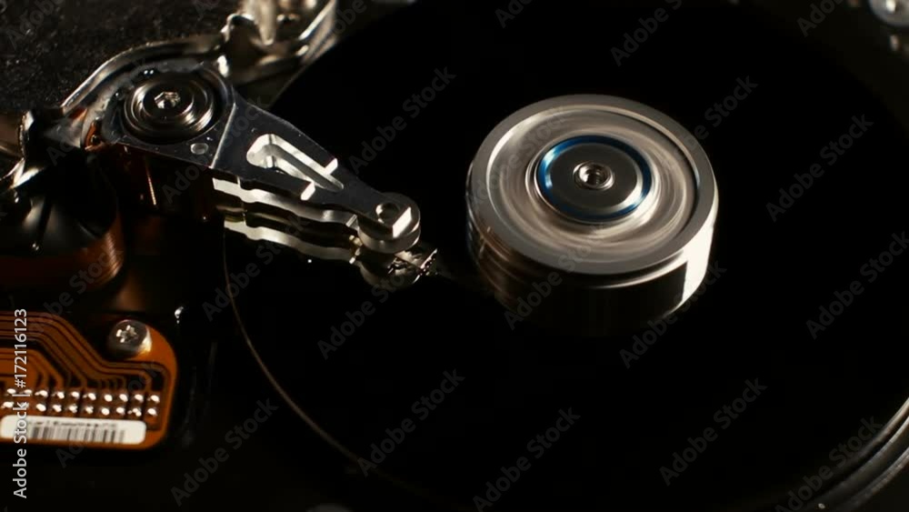 Zoom shot of disassembled hard disk. Hdd working process. Zoom shot of disassembled hard disk. Hdd working process.