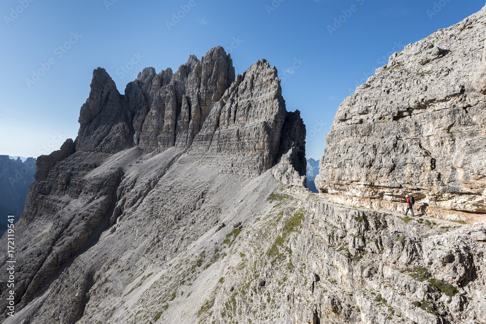 Sesto / Sexten, province of Bolzano, Dolomites, South Tyrol, Italy. Climber on the via ferrata Sesto / Sexten, province of Bolzano, Dolomites, South Tyrol, Italy. Climber on the via ferrata